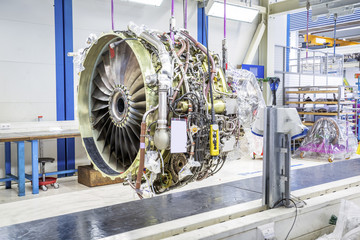 Naklejka premium Big airplane engine during maintenance