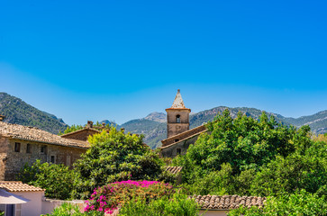 Fototapeta na wymiar Idyllic view to an old mediterranean village at Majorca Spain
