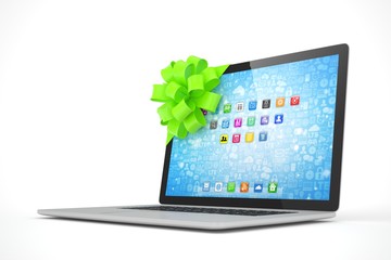 Tied laptop with green bow on white background. Modern present or gift for birthday, holiday, christmas. 3D rendering.