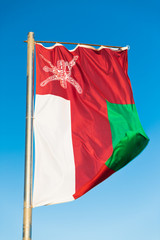 National flag of Oman on flagpole