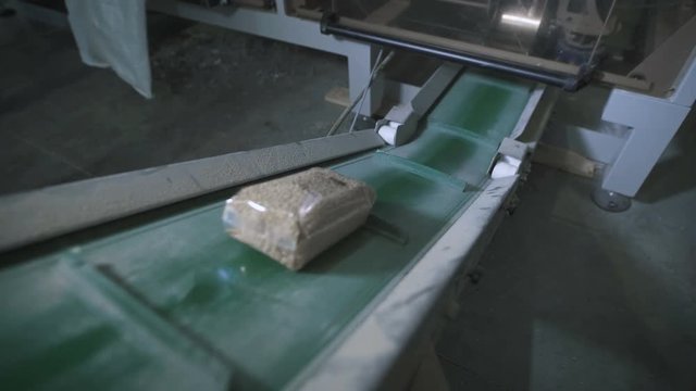 oatmeal cereal is packaged in bags at the factory.