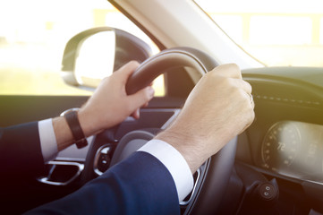 Business man driving his car