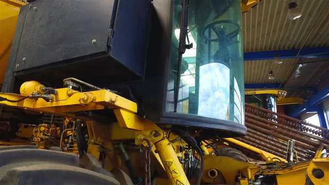 Combine harvester tractor farm vehicle 4k close up video. Agriculture machine