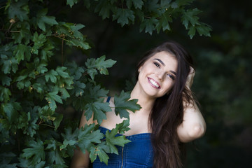 Close-up portrait of a beautiful young caucasian woman with clean skin, long hair and casual makeup