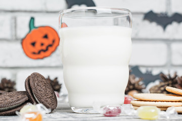 Halloween cookies with a glass of milk