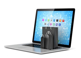 laptop and  shopping pags on white background. 3d rendering.