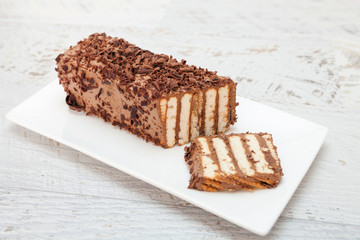 Slice of chocolate and biscuit cake
