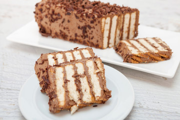 Slice of chocolate and biscuit cake