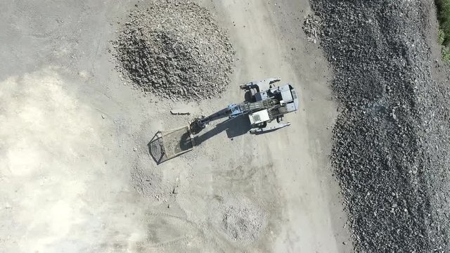 Degraded landscape in south of Poland. Destroyed land. Excavators digger works. View from above.