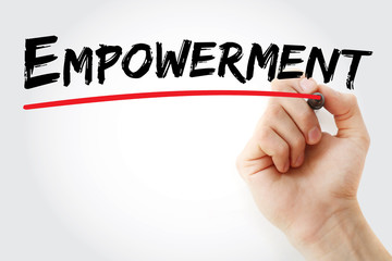 Hand writing Empowerment with marker, concept background