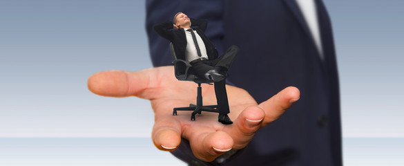 Naklejka premium Man relaxing on his chair at the office