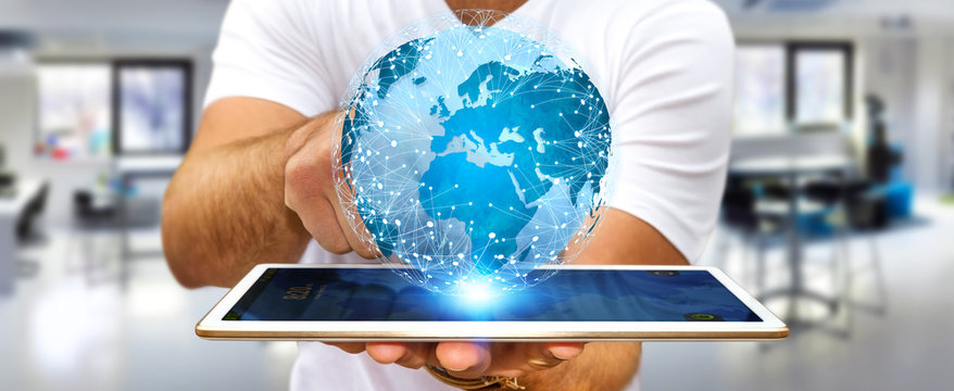 Businessman connecting different places of the world