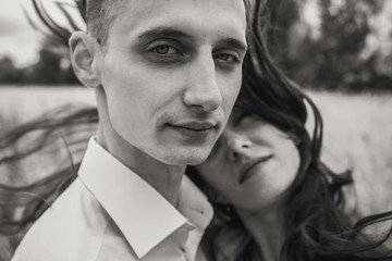 Stylish couple in the field