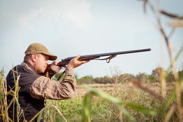 Fototapeta premium Hunter wild duck hunting