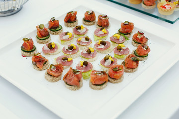 Set a variety of  canapes and snacks