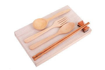 Various wooden kitchen utensils on table top view