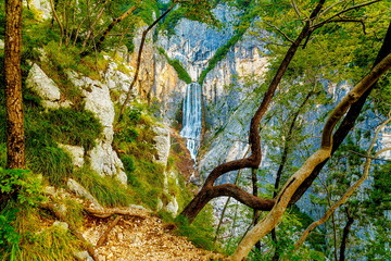 Big waterfall in the mountains. Slovenia Landscape.