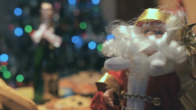 Toy Santa Under The Christmas Tree and Holiday Table 2