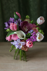 bouquet of pink flowers on a light background Rustic green