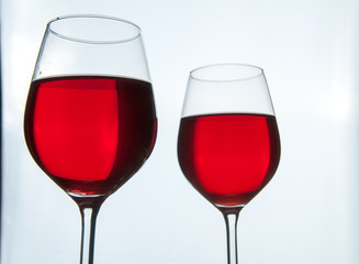 Two glasses of red wine isolated