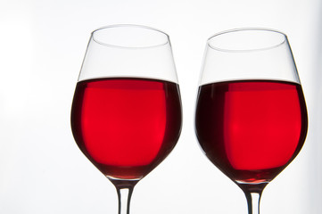 Two glasses of red wine isolated
