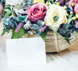 delicate floral bouquet with blank card for text
