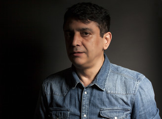 Fototapeta premium Portrait of man in Blue jean shirt