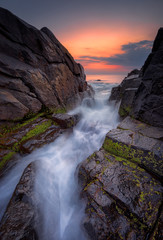 Dawn among the rocks / 
Sea sunrise at the Black Sea coast near Sozopol, Bulgaria