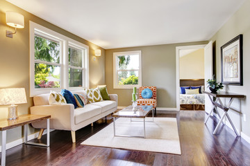 Modern furnished living room interior with hardwood floor