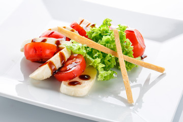appetizing restaurant food Light salad with cheese on white background