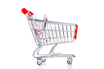 Empty shopping cart closeup on white background