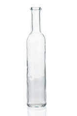 Empty glass bottle closeup on white background