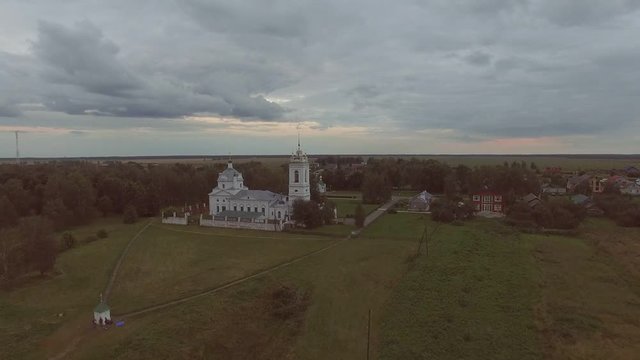 AERIAL of a beautiful white church in the at night