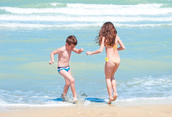 Children having fun on the beach