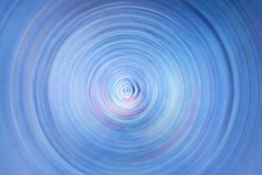 Radial spiral ripple blue abstract background
