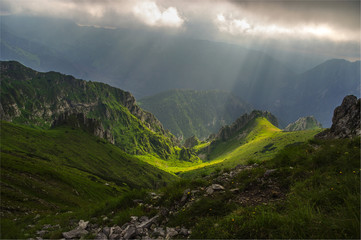 Western Tatras. The sun's rays fall on the peaks