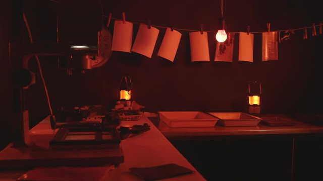 Black and white film processing equipment in amateur photography darkroom