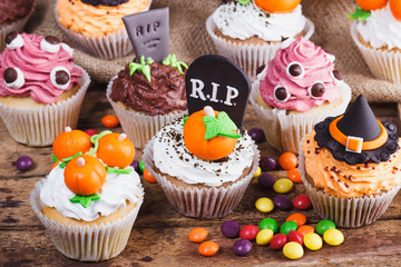 Halloween cupcakes with colored mastic decorations