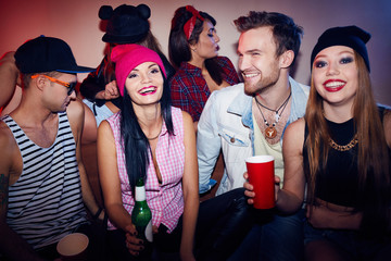 Excited Friends Clubbing at Swag Party
