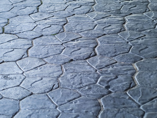 floor made of stone tiles painted in bluish grey 