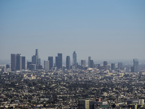 View of the downtown Los Angeles skyline at afternoon, from Griffith Observatory, in Griffith Park, Los Angeles, California.