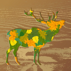 silhouette of a deer with leaves