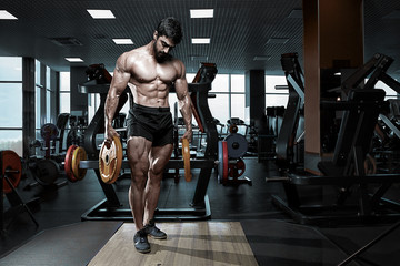 Fototapeta na wymiar Muscular athletic bodybuilder fitness model