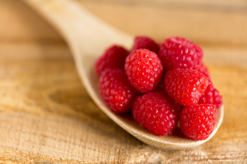 Rasberries wooden spoon