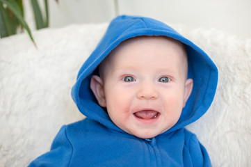 Boy with atopic dermatitis smiles and rejoices