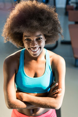 Plakat Filtered image portrait of attractive afro woman enjoying time a
