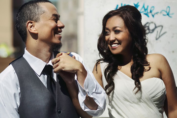 .Happy stylish smiling asian couple