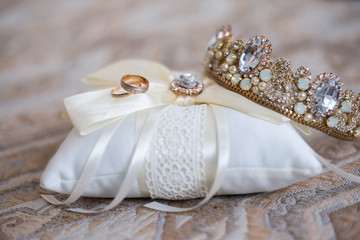 wedding rings and tiara