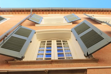 Traditional shutters in blue on Provencal house