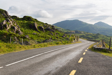 asphalt road and hills at connemara in ireland